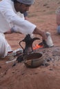 A Bedouin Prepares Traditional Coffee in Wahiba Sands, Oman