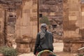 Bedouin riding a Camel in Petra, Jordan Royalty Free Stock Photo