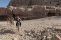 Bedouin riding a donkey