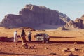 Bedouin`s car jeeps and tourists, Wadi Rum desert in Jordan, Middle East