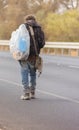 Bedouin walking on the road