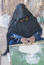 Bedouin woman making traditional bread