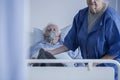 Bedridden man wearing oxygen mask Royalty Free Stock Photo