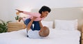 Bedroom, airplane and black family, father and happy child playing, having fun and enjoy fun flying game for home Royalty Free Stock Photo