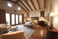 Bedroom With Beamed Wooden Ceiling