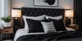 A bedroom with a black bed and white pillows. Royalty Free Stock Photo