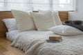 Bedroom with black and white pillows on bed Royalty Free Stock Photo