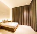 Bedroom with brown curtain