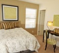 Bedroom with desk and table lamp Royalty Free Stock Photo