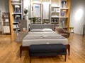 A bedroom  display at a West Elm Midcentury Modern furniture store in Orlando, Florida Royalty Free Stock Photo