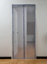 Bedroom door with cloth mosquito net