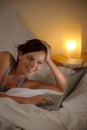 Bedroom evening - woman with laptop