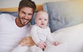 Bedroom, happy and portrait of father with baby for bonding, relationship and love for parenting. Family, home and dad Royalty Free Stock Photo