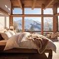 The bedroom has large window frames overlooking the Alpine winter mountains. Eco lodge house