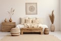 Bedroom interior in boho style in white and beige colors bed with white bedding, blanket, pillows, wooden commode, dried Royalty Free Stock Photo