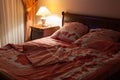 Bedroom interior with table-lamp at night Royalty Free Stock Photo