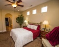 Bedroom With Lamps, Nightstands And Bed