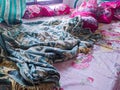The bedroom is a mess. A child\'s room with a messy bed and pillows, bolsters and quilts that have not been tidied up