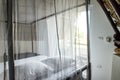 Bedroom with mosquito net, holiday