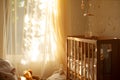 Bedroom nursery, bathed in soft golden light filtering through translucent curtains. AI Generated