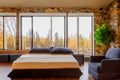 A bedroom overlooking the autumn forest Royalty Free Stock Photo