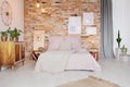 Bedroom with pallet side table Royalty Free Stock Photo