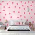 a bedroom with pink polka dots on the wall Royalty Free Stock Photo