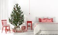 Bedroom with red decorations and Christmas tree