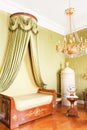 Bedroom with royal canopy bed Royalty Free Stock Photo