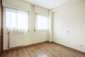 Bedroom with two windows and wardrobe Royalty Free Stock Photo