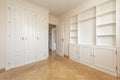 bedroom with wardrobe and white lacquered wooden bookcase Royalty Free Stock Photo