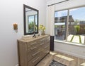 Bedroom Dress And Mirror Looking Out To Rear Patio