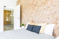 Bedroom with wooden mosaic wall Royalty Free Stock Photo