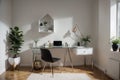 Bedroom working corner decorated with hexagon gold stainless vase and artificial plant in glass vase on gray spray-painted working