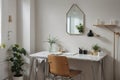 Bedroom working corner decorated with hexagon gold stainless vase and artificial plant in glass vase on gray spray-painted working