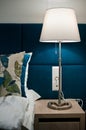 Bedside table lamp in bedroom detail Royalty Free Stock Photo