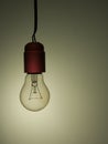 Bedsit style old incandescent light bulb Royalty Free Stock Photo