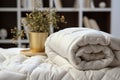 Bedtime elegance White pillow, blanket, and luxury down comforter concept