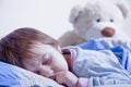 Bedtime. Happy dreams of a little girl. Child girl relaxing in b