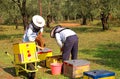 Bee boxes and bee keepers 2 Royalty Free Stock Photo