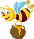 Bee cartoon holding honey bucket