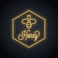 Bee honey neon logo. Honeycomb neon sign