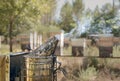 Bee smoker, a beekeeping basic equipment Royalty Free Stock Photo