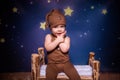 Beeb sitting on the bed Royalty Free Stock Photo