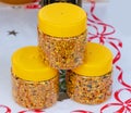 Beee polen granules in plastic containers