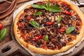 Beef barbeque Pizza with minced meat, red onion, chili pepper, black olives and mozzarella cheese Royalty Free Stock Photo