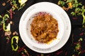 Beef bhuna karahi served in dish isolated on dark background top view of indian spices food