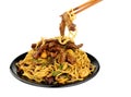 Beef in black bean sauce stir fry with chopsticks Royalty Free Stock Photo