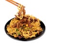 Beef in black bean sauce stir fry with chopsticks Royalty Free Stock Photo