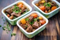 beef bourguignon meal prepped in individual containers